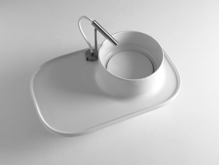 UP 700 - Countertop round ceramic washbasin with integrated countertop _ BLEU PROVENCE